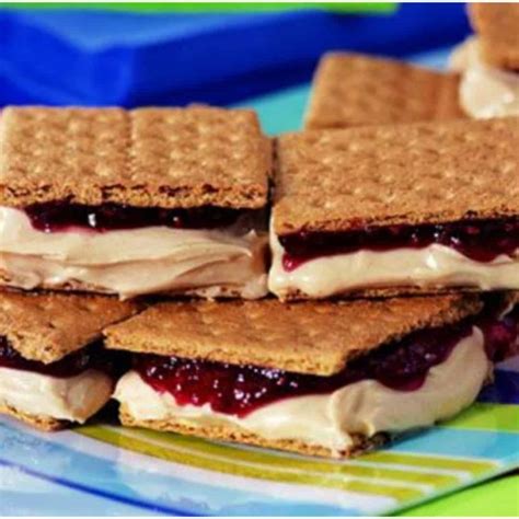 It combines the flavors of <strong>peanut butter and jelly</strong> with the crunch of popcorn. . Peanut butter and jelly graham cracker sandwich